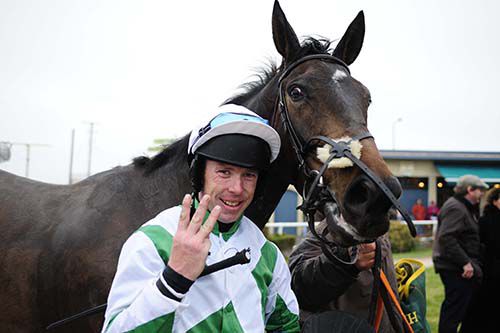 Andrew Lynch celebrates his treble after Miss Peacetime's victory