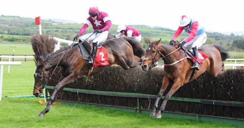 Real Steel, red cap, blunders at the last but stays on to win in Punchestown