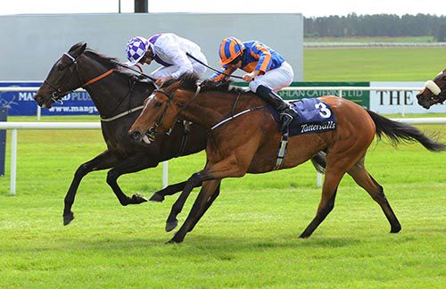 Pleascach winning her first Classic at the Curragh