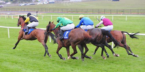 Go Forty Go, left, battles to victory in Tramore