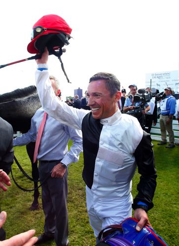 Frankie Dettori salutes the crowd after Golden Horn's Investec Derby win