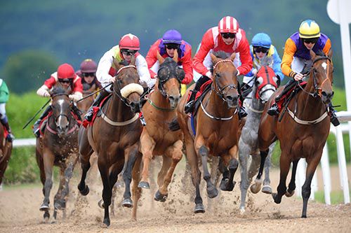 Balmont Blast (second from right) turns into the straight under Oisin Orr