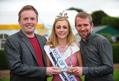 Owners Daniel McDonnell (left) and Johnny Ward receive their prize from the newly crowned Rose Of Tralee Elysha Brennan 