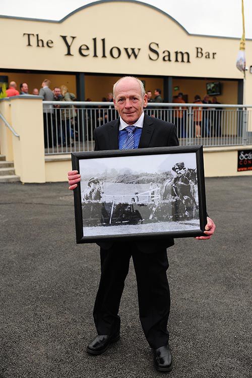 Bellewstown 2014 Yellow Sam Jockey Mick Furlong with a picture of the race on the day that he landed the gamble for Barney Curley 