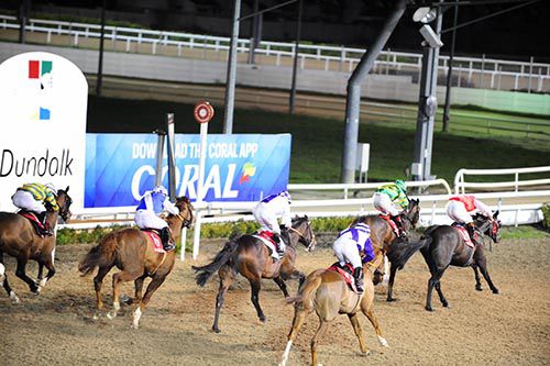 Saga Bolton (red, right) gets there to land the last at Dundalk for Ronan Whelan