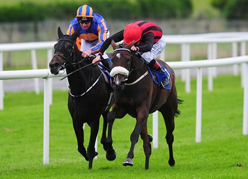Red and black Pat Smullen aboard A Shin Kildare beats Eavesdrop and Seamie Heffernan
