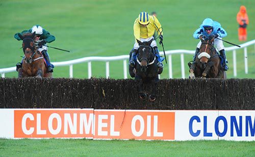 Yellow silks Ruby Walsh leads Thanks For Tea (left) and Rock On The Moor home, aboard winner, Westerner Lady