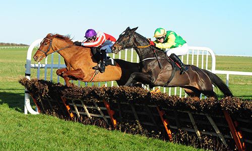 Catcheragain (left) is pressed by Canny Tom at the last