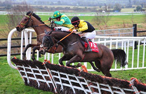 Graphic Legacy (Ricky Doyle, nearside) battles it out with Rock On Barney (Mikey 

Fogarty)