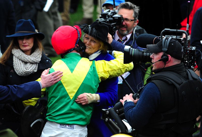 Robbie Power embraces Jessica Harrington after Gold Cup win on Sizing John
