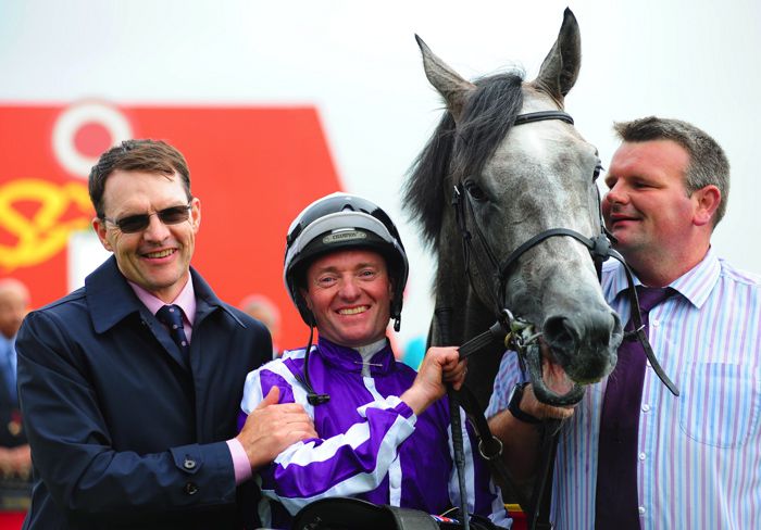 Capri and delighted connections after his Irish Derby win