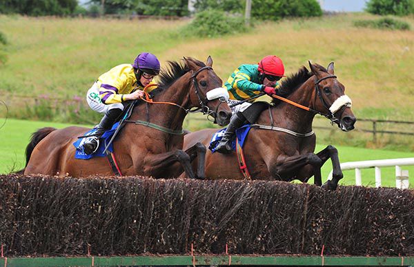 Rock On Fruity, far side, challenges Definite Soldier at the last in Limerick