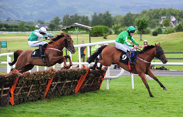Open To The World clears the last ahead of Kilbarry Marien