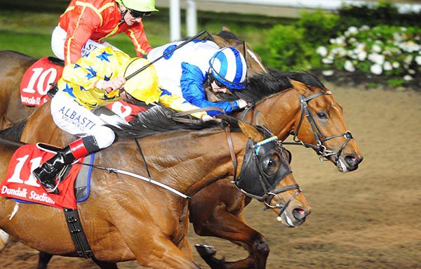 Colin Keane (blue/white) and Pat Smullen (yellow) battle out a tight finish at Dundalk last week