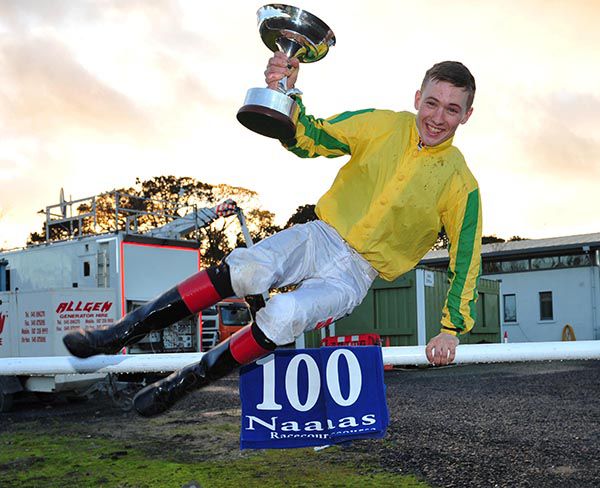Champion Jockey Colin Keane celebrates his 100th winner of the season at Naas 