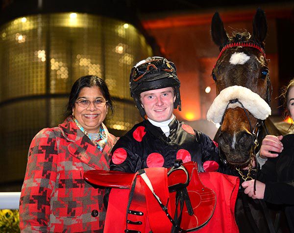Winning owner Rita Shah pictured with Conor McGovern