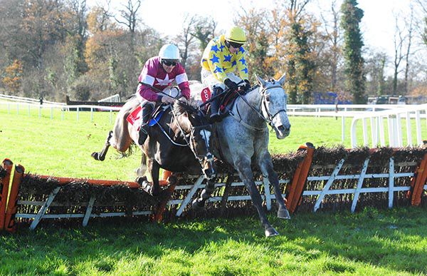Mortal (left) and Davy Russell about to fall at the last upsides Carter McKay at Gowran 