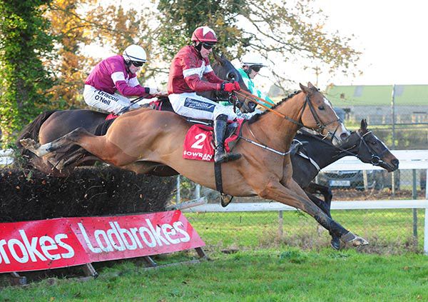 Dounikos and Keith Donoghue on their way to victory