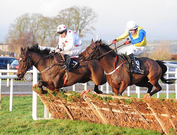 Our Boy Boru (Robbie Colgan, white and red) battles it out with Swift (Mark Enright, nearside)