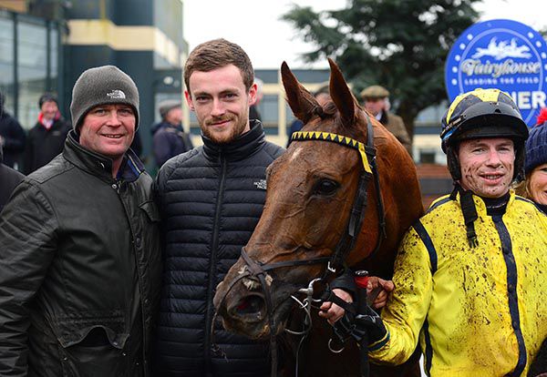 Champayne Lady with jockey Denis O'Regan, trainer Alan Fleming (left) and owner Rory Connell 