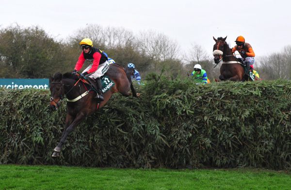 Action over the National fences at Aintree