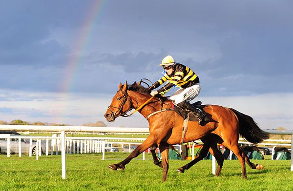 Macgiloney gets to the front under a rainbow at Kilbeggan