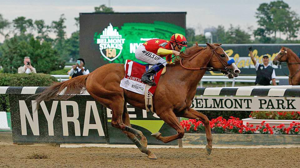 Justify winning the Belmont Stakes and Triple Crown in 2018