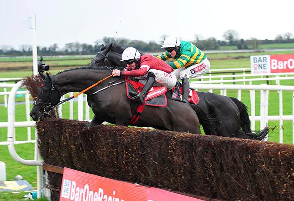 Delta Work (Davy Russell) leads from Le Richebourg (Barry Geraghty)