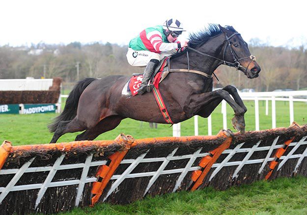 Chatham Street Lad (Luke Dempsey) puts in a fine leap at the last
