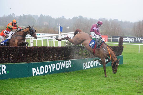 A great shot of Woods Well and Mark Enright who survived this last fence blunder