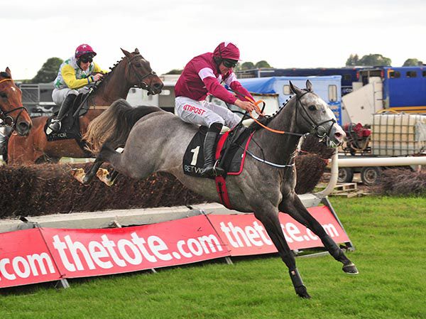 Farclas and Davy Russell clear the last