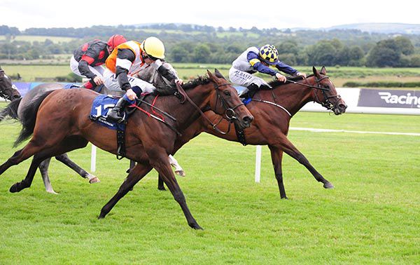  SERVALAN and Shane Foley (far side) win the Listed Yeomanstown Stud Irish EBF Stakes at Naas 
