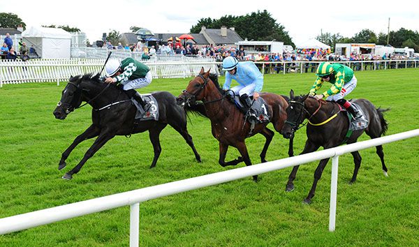 Green and white silks Shane Foley wins race 2 at Bellewstown on Yulong Voice