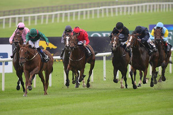 Tarnawa, second left, goes for home