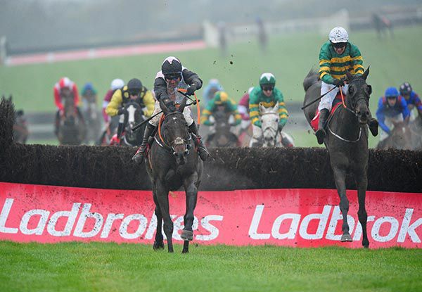 Chris's Dream (left) beating Fitzhenry in the Troytown Chase at Navan in November