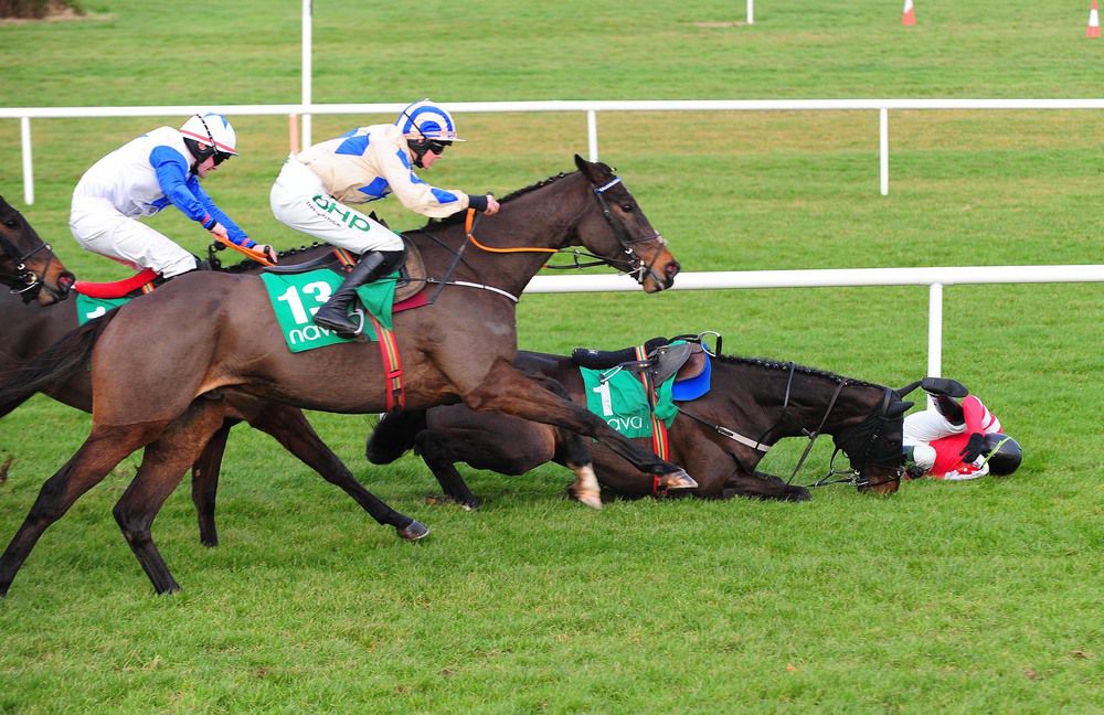 Blackbow and Paul Townend take a fall as Captain Guinness and Rachael Blackmore (nearside) head for victory at Navan