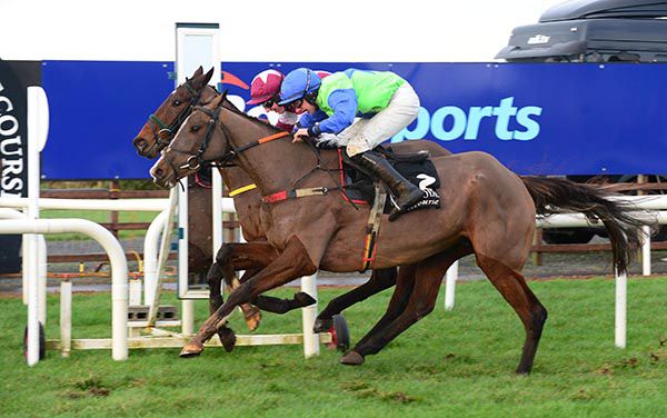 A great shot of Opposites Attract (Conor Maxwell, nearside) touching off Momus (Eoin Walsh)