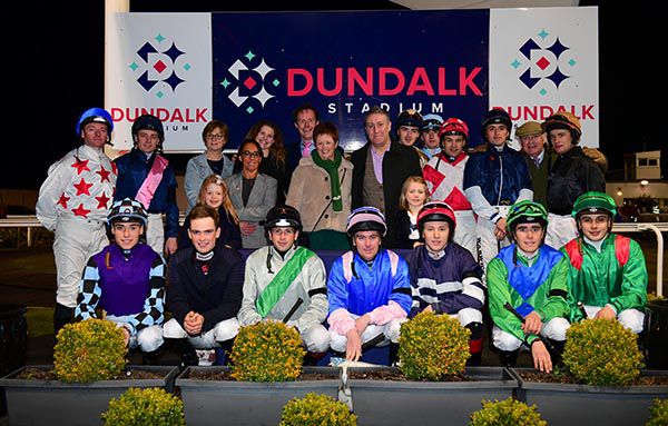 The late Willie Buckley's family with the jockeys before his memorial race