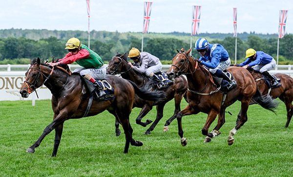 Nando Parrado and Adam Kirby (left) win the Coventry Stakes for Clive Cox