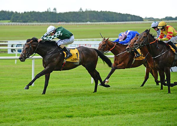 Ancient Spirit and Shane Foley (left) win the Celebration Stakes On Derby Day at the Curragh