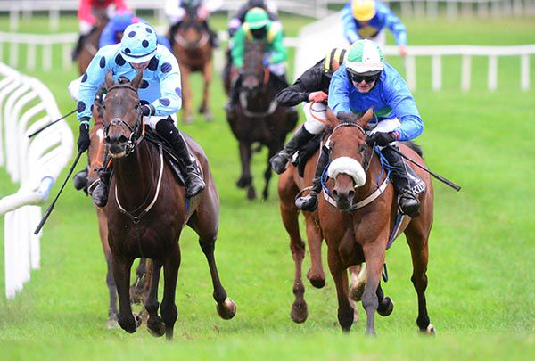 Eilise's A Lady and Aaron Fahey (right) win the Kilbeggan INH Flat Race from Western Run (left)