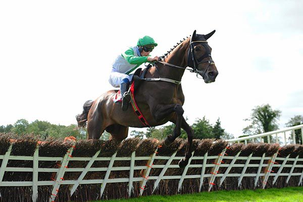 Getaway Gorgeous and David Mullins jump the last 