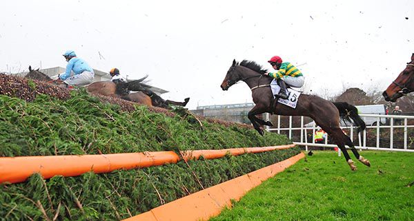 Uisce Beatha and Simon Torrens chasing them down at Leopardstown