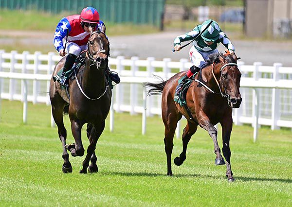 Mooneista (right) and Colin Keane winning the Paddy Power Sapphire Stakes