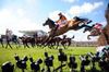 Follow The Plan lands over the third in front of a line of cameras before going on to win the Grade 1 Betfred Bowl for Oliver McKiernan and Tom Doyle at 50/1. Aintree 12-04-2012