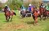 Barry John Foley (blue) is about to be unseated by Vixen Belle after the last leaving Merramax under Damien Murphy (left) to come home in front for trainer Jimmy Mangan. Dromahane 15-04-2012