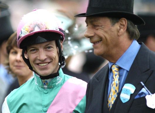 Henry Cecil (right) trains Midday