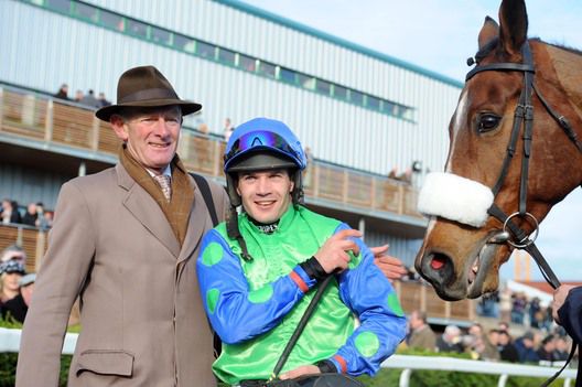 Arthur Moore pictured with jockey Robbie Colgan 