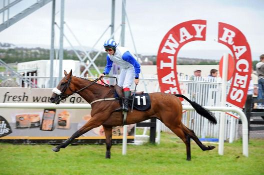 Shane Butler celebrates victory aboard First Trim