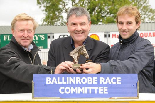 Michael Grassick Snr (Left) and Michael Grassick Jnr (Right) accepting their prize 